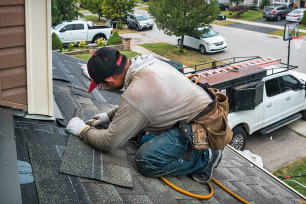 Professional Flat Roof Repair technician working in Locke, NY
